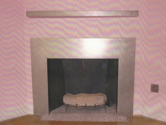 Concrete and stainless steel fireplaces